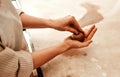 Get crafting. an unrecognizable artisan shaping a ball of clay with her hands.