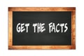 GET THE FACTS text written on wooden frame school blackboard