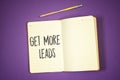 Get more leads concept on notebook or agenda with pencil Royalty Free Stock Photo