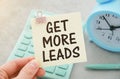 Get more leads text on card in famale hands