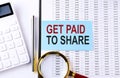 GET PAID TO SHARE on sticker on chart background, business concept