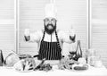 Get ready. Man bearded chef getting ready cooking delicious dish. Chef at work starting shift. Guy in professional Royalty Free Stock Photo