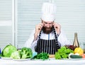 Get ready. Man bearded chef getting ready cooking delicious dish. Chef at work starting shift. Guy in professional Royalty Free Stock Photo