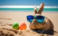 Cool bunny with sunglasses on the beach, multicolor easter eggs around, blurred blue ocean background generative AI