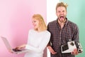 Get rid of junk. Ways to sell your old stuff for most money. Woman with modern laptop and man with old retro typewriter Royalty Free Stock Photo