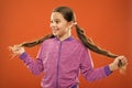 Get rid of split ends. Girl cute child with long hair double ponytails hairstyle. Split ends treatment. How to prevent Royalty Free Stock Photo