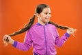 Get rid of split ends. Girl cute child with long hair double ponytails hairstyle. Split ends treatment. How to prevent Royalty Free Stock Photo