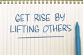 Get rise by lifting others, text words typography written on paper background, life and business motivational inspirational