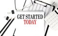 GET STARTED TODAY word on notepad with clipboard , chart and calculator, business concept