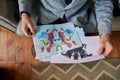 Get therapy. Top view of psychologist choosing picture with ink stain, Rorschach Inkblot during therapy session