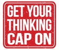 GET YOUR THINKING CAP ON, text written on red stamp sign Royalty Free Stock Photo