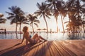 Getaway retreat in luxury beach hotel, luxury travel, woman relaxing near swimming pool Royalty Free Stock Photo