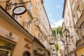 Getreidegasse - pedestrian shopping street in the old town of Salzburg, Austria