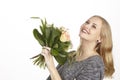 She gets a bouquet of flowers (roses) fpr birthday Royalty Free Stock Photo