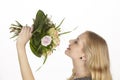 She gets a bouquet of flowers (roses) fpr birthday Royalty Free Stock Photo