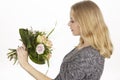 She gets a bouquet of flowers (roses) fpr birthday Royalty Free Stock Photo