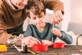 Quick learner kid working an advanced instrument almost perfectly.