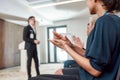 Getting It Done. Cropped shot of audience applauding speaker after his talk at business meeting, economic forum at Royalty Free Stock Photo