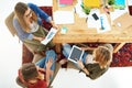 Getting down to their project. High angle shot of a group of female university students working on a project together at Royalty Free Stock Photo