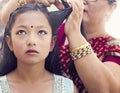 Getting hair ready for traditional Nepalese Ceremony