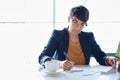 Getting the job done. a businesswoman working on paperwork in her office. Royalty Free Stock Photo