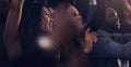 Getting lost in the new years celebrations. Cropped shot of a group of young friends dancing together in a nightclub. Royalty Free Stock Photo