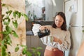 Getting my caffeine boost. a young woman pouring herself a cup of coffee. Royalty Free Stock Photo