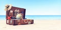Getting ready for summer holidays - Leather suitcase with travel accessories Royalty Free Stock Photo