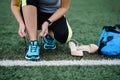 Getting ready for training. The concept of female feet after work.