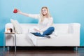 Happy woman showing cup of tea Royalty Free Stock Photo