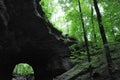 Hiking a wooded trail in Kentucky leading to a cave. Royalty Free Stock Photo