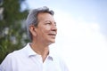 Getting some fresh air. a handsome mature man standing outdoors. Royalty Free Stock Photo