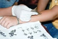 Getting temporary tattoo Royalty Free Stock Photo