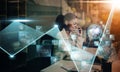 Getting things done is the hallmark of a go getter. a young businesswoman using a mobile phone and computer at her desk