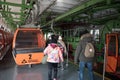 Great wall of china mutianyu cable car station, boarding time friends back-view Royalty Free Stock Photo