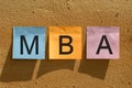 Getting your MBA, close-up of colorful stickers with MBA text