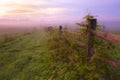 Gettysburg, PA /USA- Summer 2018. Sunrise over misty grassland with wooden fence in the foreground. Royalty Free Stock Photo