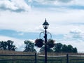 Gettysburg, Pennsylvania, lightpost on walkway with hanging plants Royalty Free Stock Photo