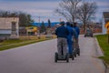 GETTYSBURG, USA - APRIL, 18, 2018: Back view line of tourists on Segways Seg Tours in Gettysburg National Military Park