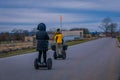 GETTYSBURG, USA - APRIL, 18, 2018: Back view line of tourists on Segways Seg Tours in Gettysburg National Military Park