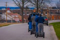 GETTYSBURG, USA - APRIL, 18, 2018: Back view line of tourists on Segways Seg Tours in Gettysburg National Military Park