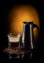 Geyser coffee maker and cup of black coffee Royalty Free Stock Photo