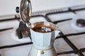 geyser coffee maker on a gas stove