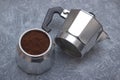 Geyser coffee maker. Prepare espresso portion. Opened coffee maker with ground coffee powder.