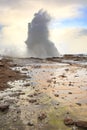 Geyser fountain discharges water at Strokkur Geysir, Iceland located at the golden circle route Royalty Free Stock Photo