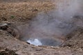 Geyser on Iceland bubbling up just after eruption Royalty Free Stock Photo