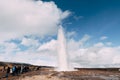 Geyser Valley in the southwest of Iceland. The famous tourist attraction Geysir. Geothermal zone Haukadalur. Tourists Royalty Free Stock Photo