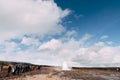 Geyser Valley in the southwest of Iceland. The famous tourist attraction Geysir. Geothermal zone Haukadalur. Tourists Royalty Free Stock Photo