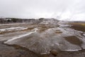 Geysir destrict Strokkur in Iceland. Tourists watching famous Royalty Free Stock Photo