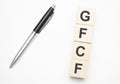 gfcf word written on wooden cubes with copy space